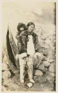Image of Ah-nee -nah with baby on her back